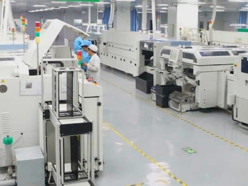Automated SMT assembly line workshop in an advanced EMS turnkey PCBA manufacturing facility