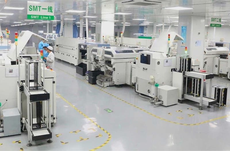 Automated SMT assembly line workshop in an advanced EMS turnkey PCBA manufacturing facility